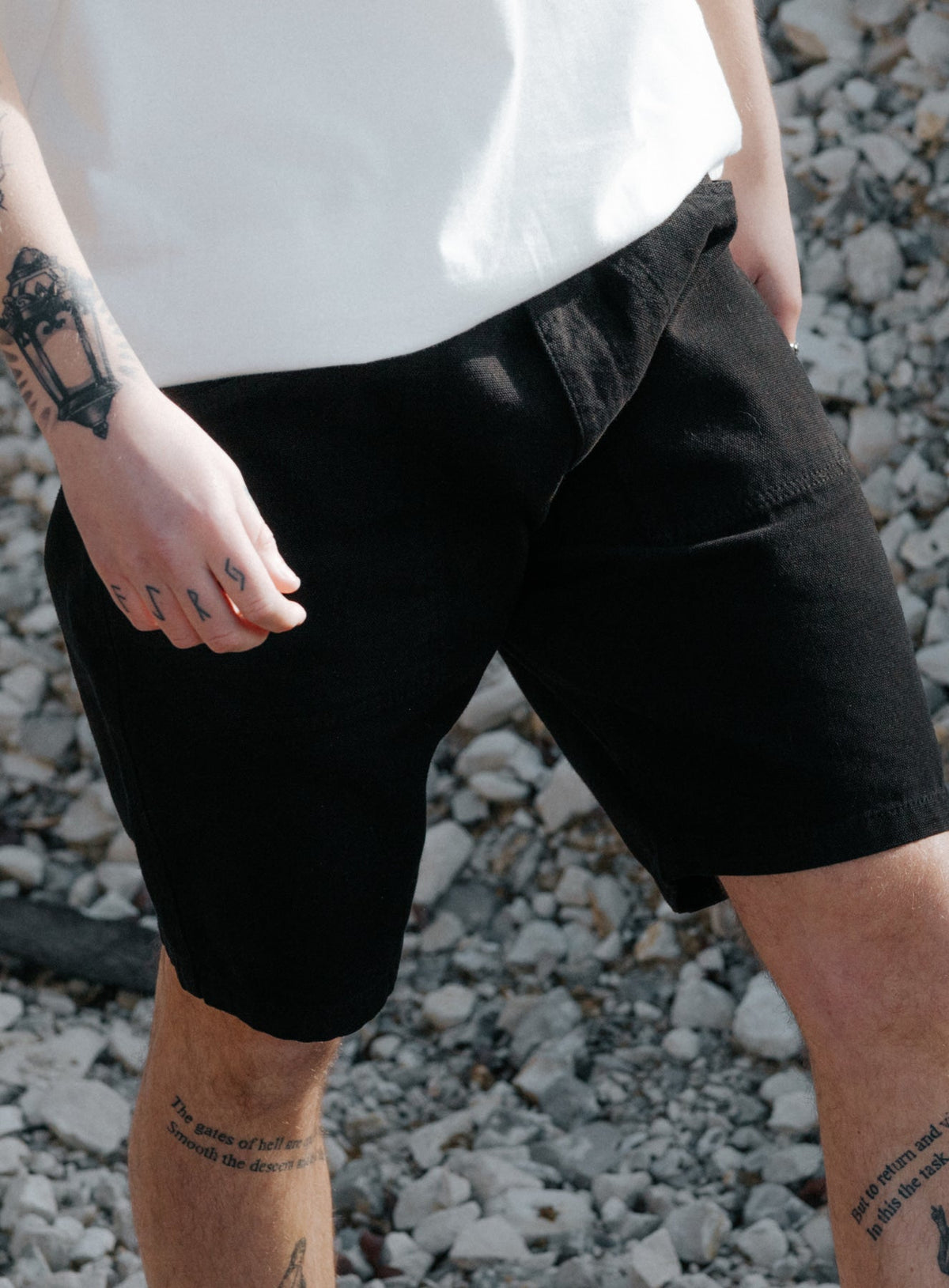 An in the field image of Men's Dissident Canvas Shorts in Obsidian Black (ITF)