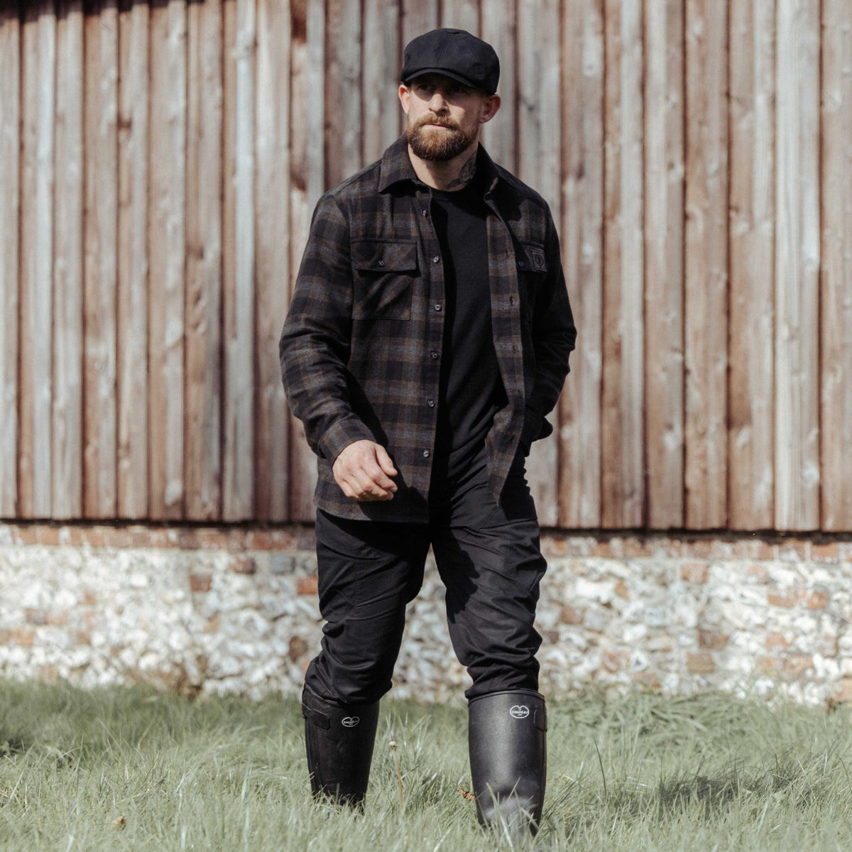 An in the field image of Men's HeriTech Badlands Flannel Shirt in Obsidian Black (ITF)