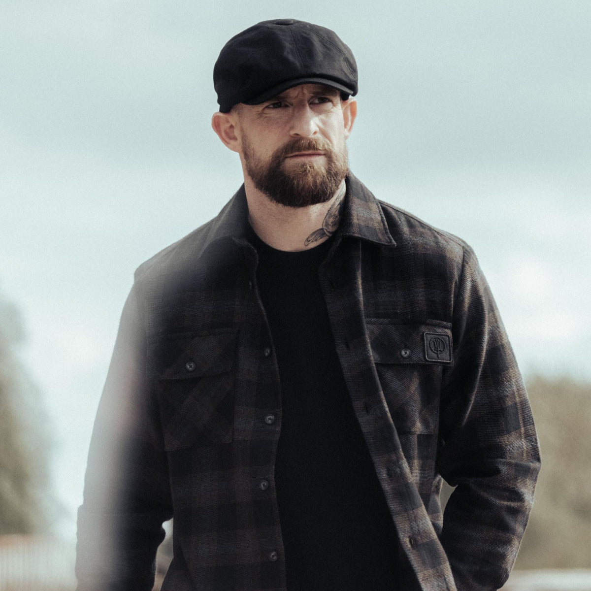An in the field image of Men's HeriTech Badlands Flannel Shirt in Obsidian Black (ITF)