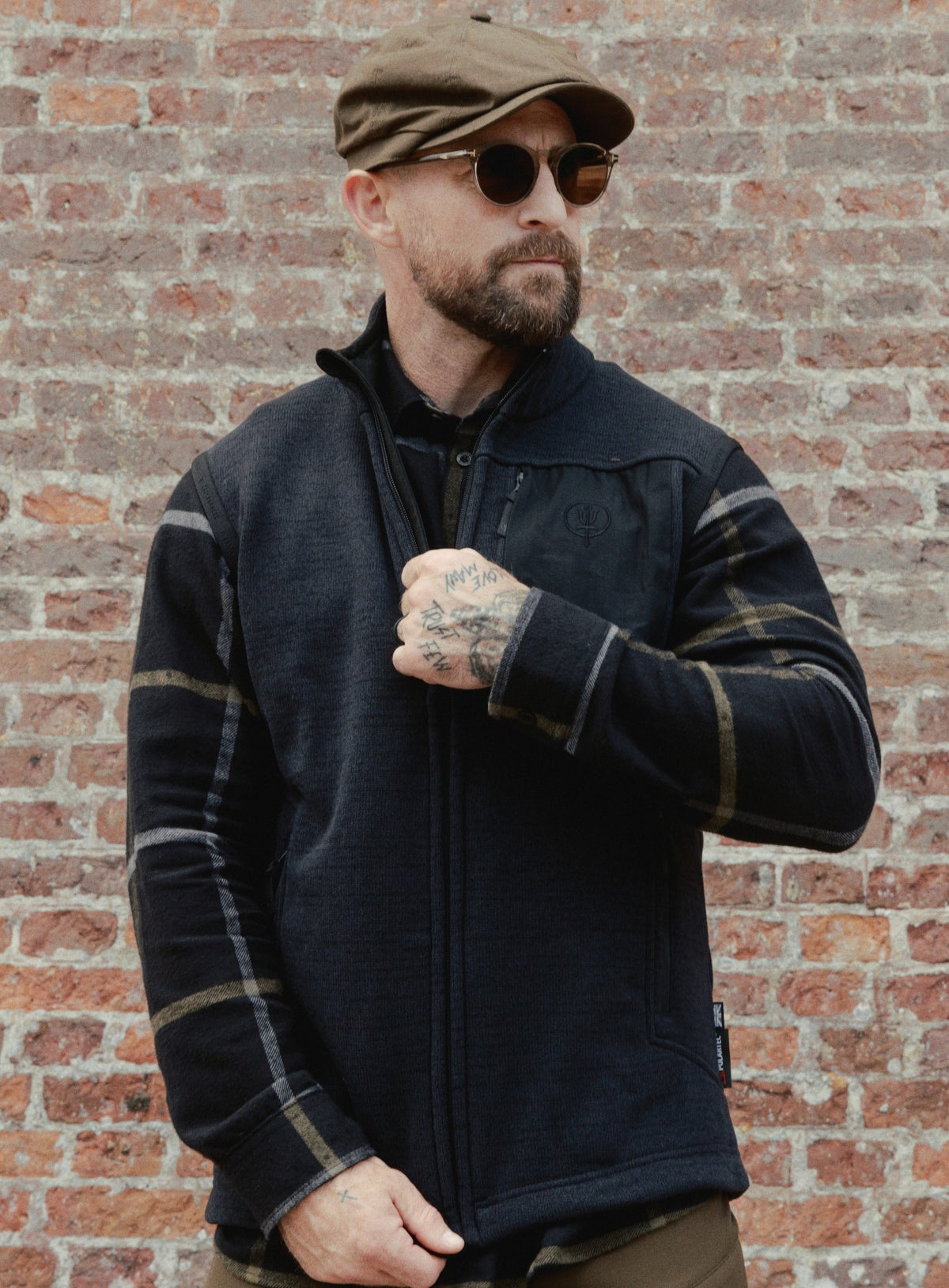 An in the field image of Men's HeriTech Moorland Fleece Gilet in Obsidian Black (ITF)