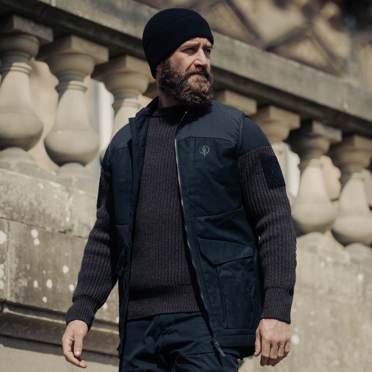 An in the field image of Men's HeriTech Hinterland Pro Gilet in Obsidian Black (ITF)