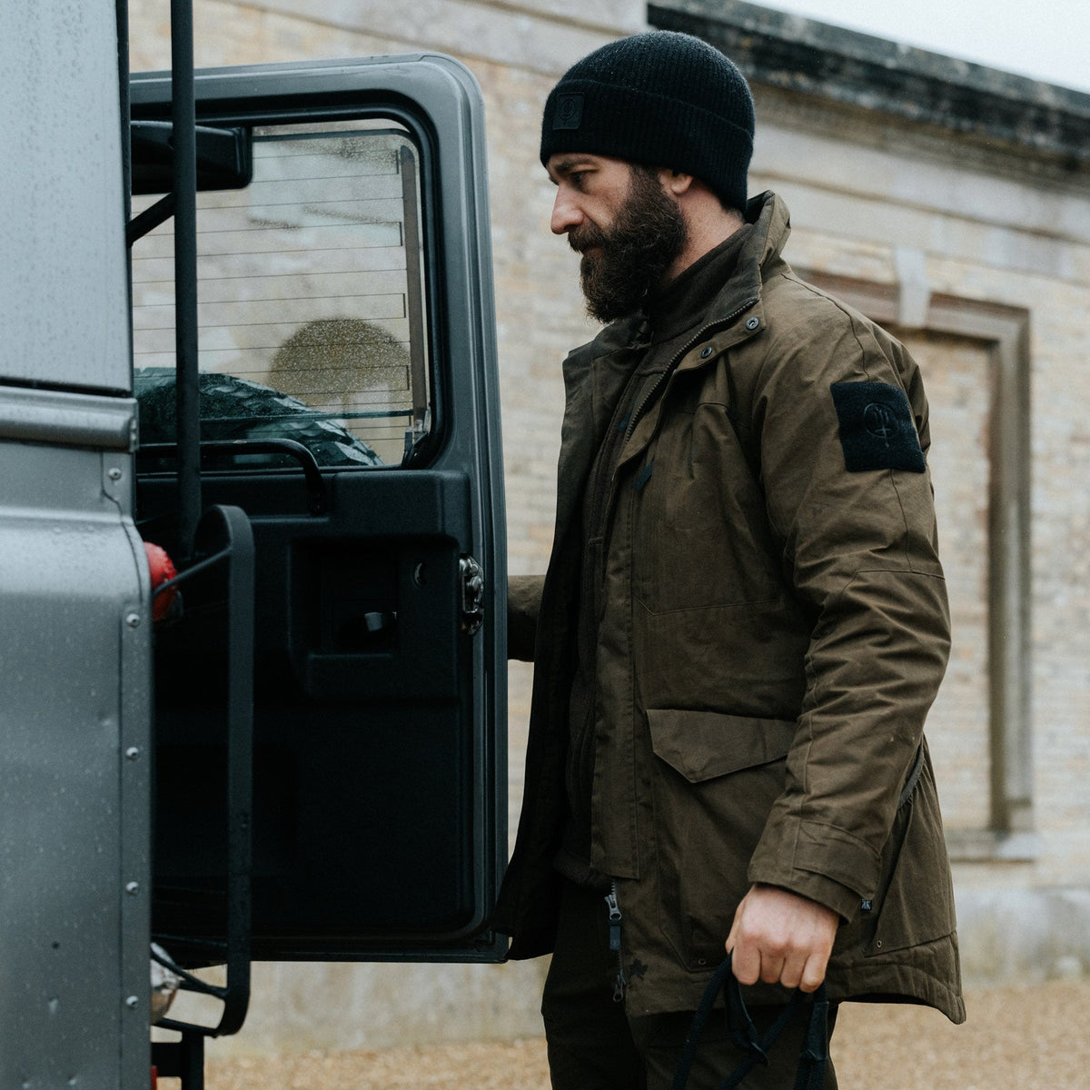 An in the field image of Men's HeriTech Grange Jacket in Khaki (ITF)