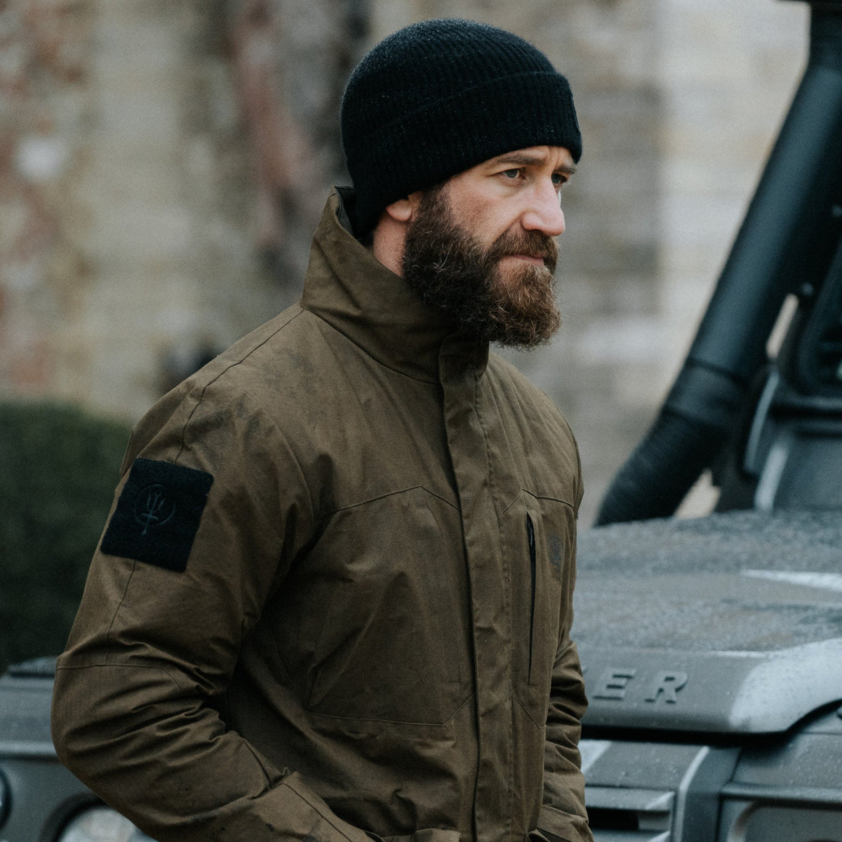 An in the field image of Men's HeriTech Grange Jacket in Khaki (ITF)