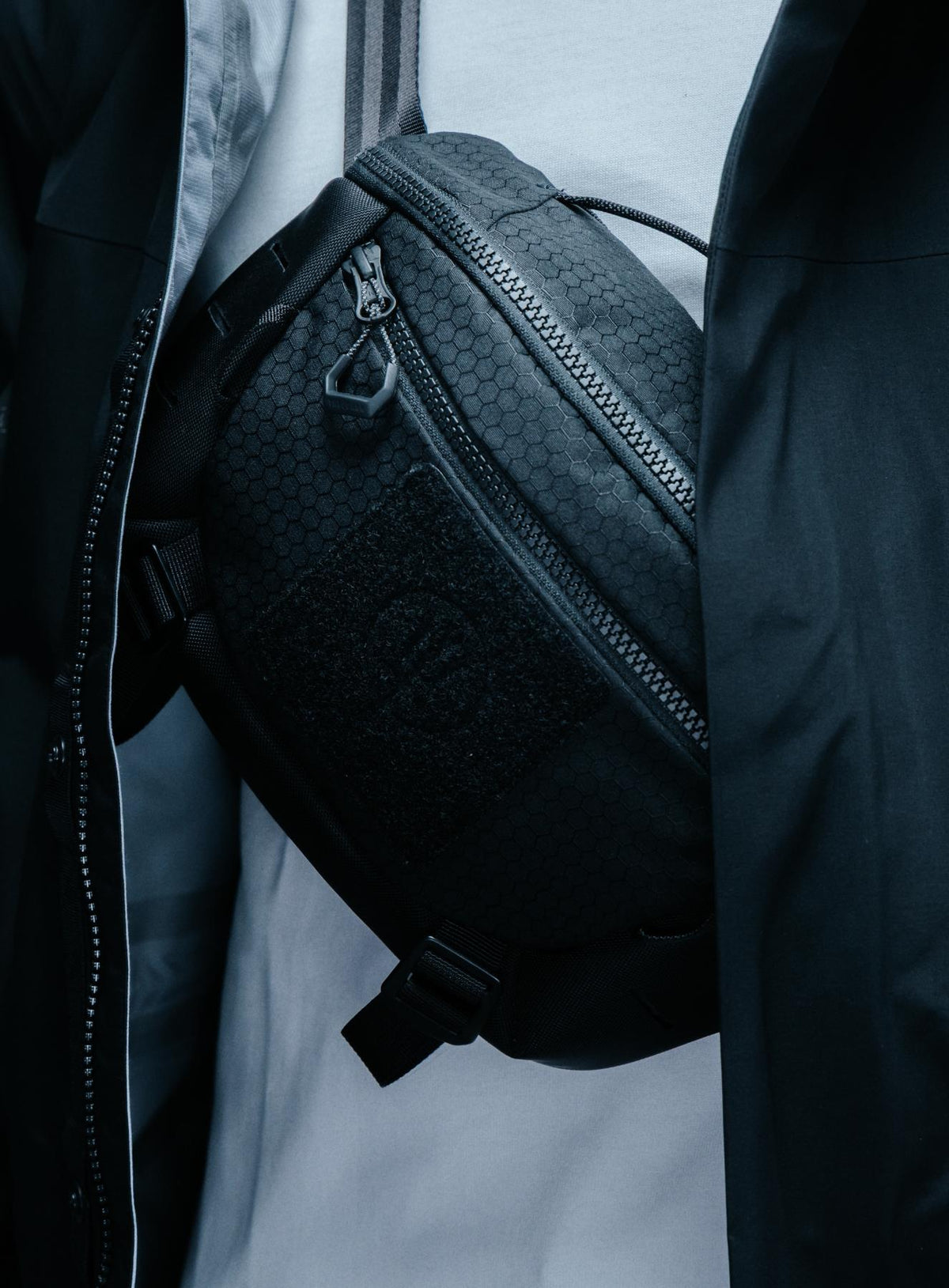 An in the field image of Spectral 5L Waist Pack in Obsidian Black (ITF)