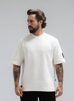 A studio shot of Men's Dissident Waffle T-Shirt in Optic White (SS)