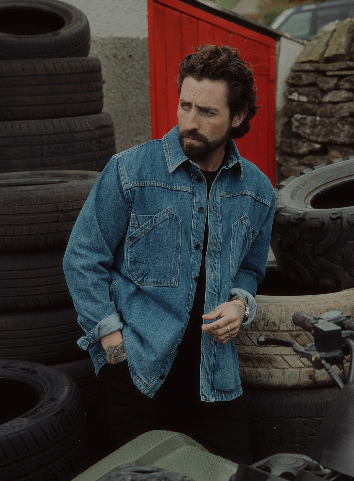 An in the field image of Men's Dissident Denim Overshirt in Navy (ITF)