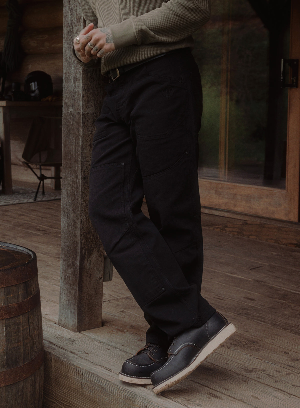 An in the field image of Men's Dissident Canvas Trousers in Obsidian Black (ITF)