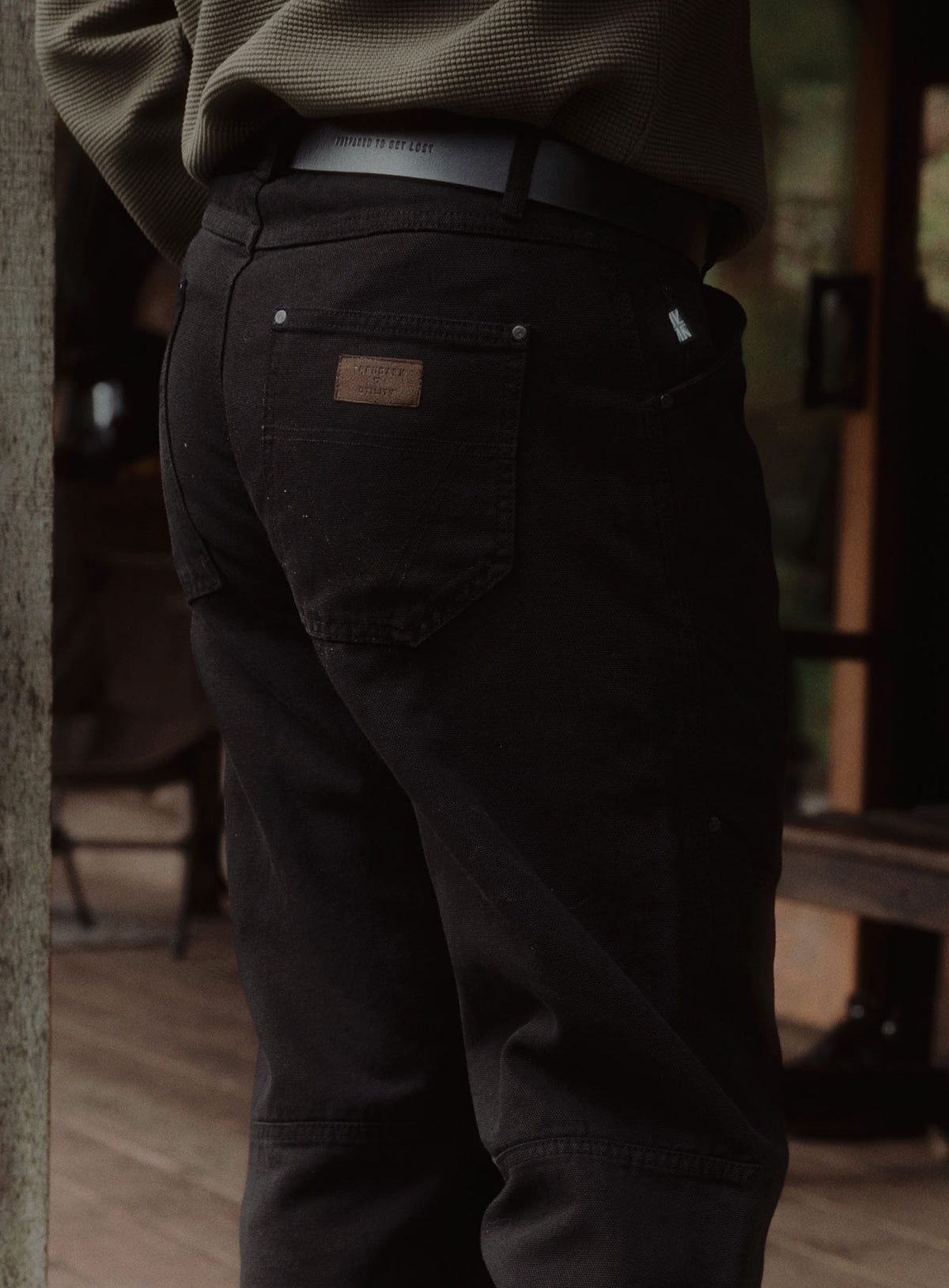 An in the field image of Men's Dissident Canvas Trousers in Obsidian Black (ITF)