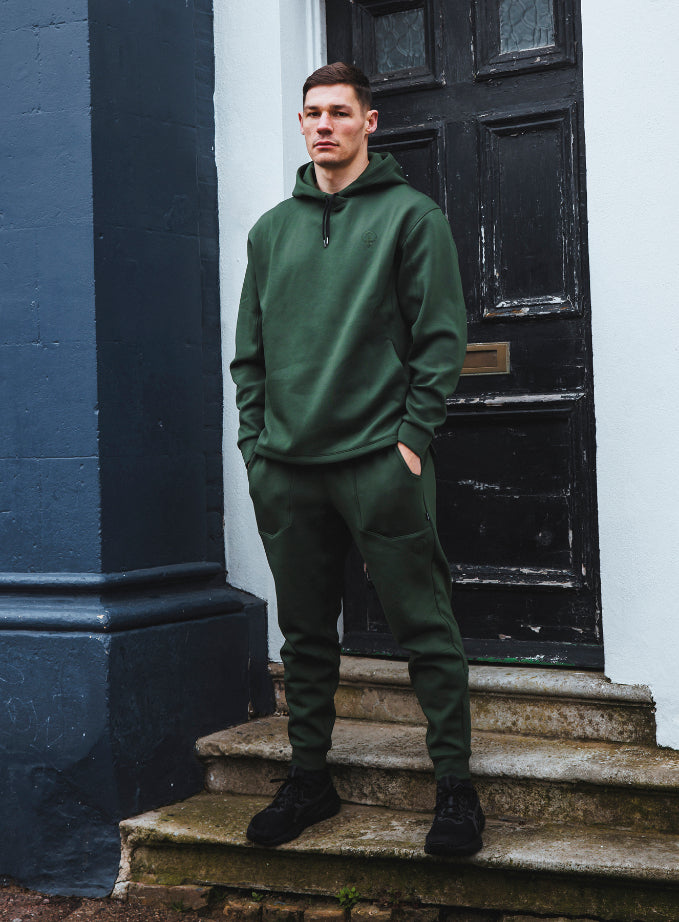 A studio shot of Force Catalyst Hoodie in Forest Green (SS)