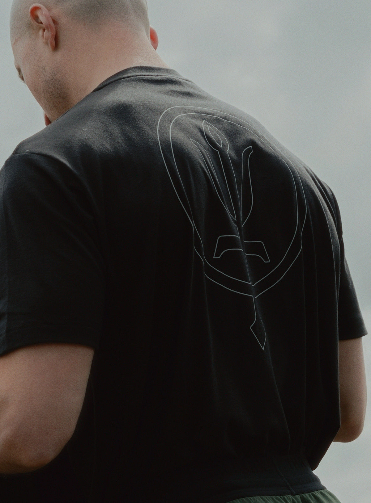 An in the field image of Force Catalyst T-Shirt in Obsidian Black (ITF)