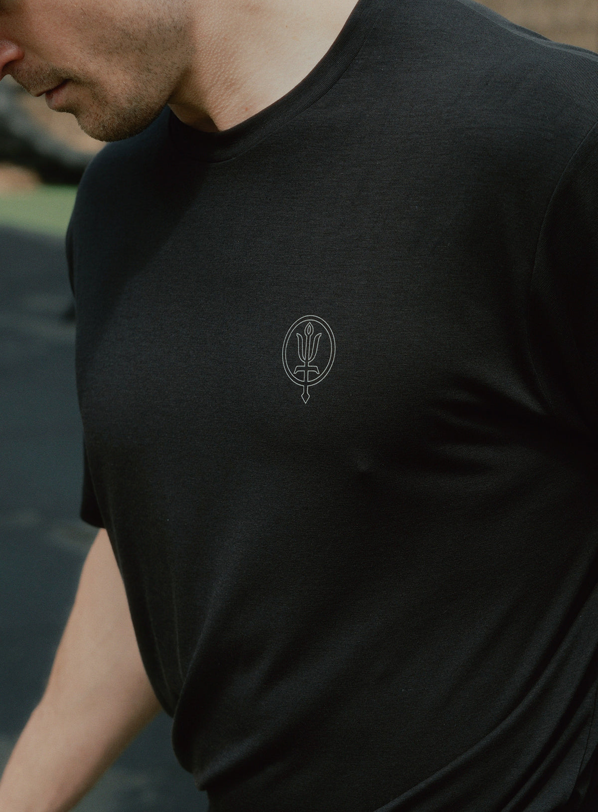 An in the field image of Force Catalyst T-Shirt in Obsidian Black (ITF)