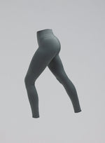 A cut-out image of Women's Force Seamless Leggings in Urban Green (GM)
