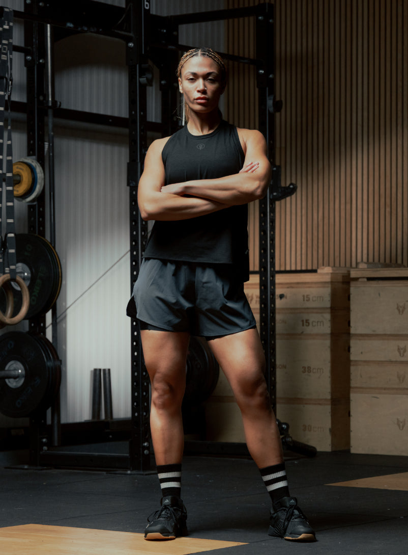 An in the field image of Women's Force 2-In-1 Shorts in Ombre Blue (ITF)