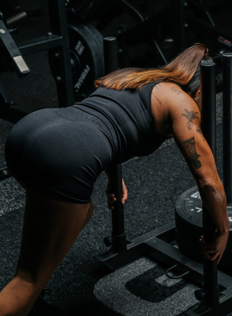 An in the field image of Women's Force Seamless Shorts in Obsidian Black (ITF)