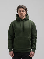 A studio shot of Insignia Hoodie in Forest Green (SS)