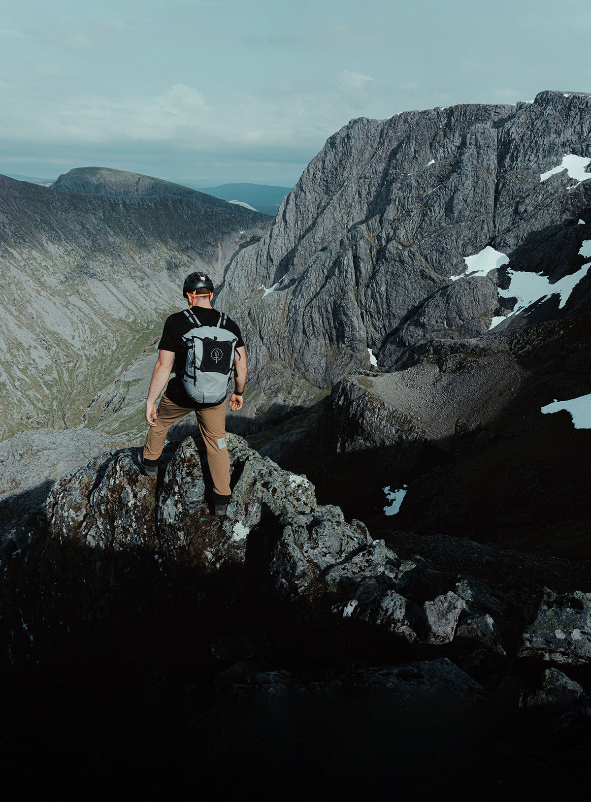 An in the field image of Orbital 30L Dyneema Climbing Backpack in Antimony Grey (ITF)