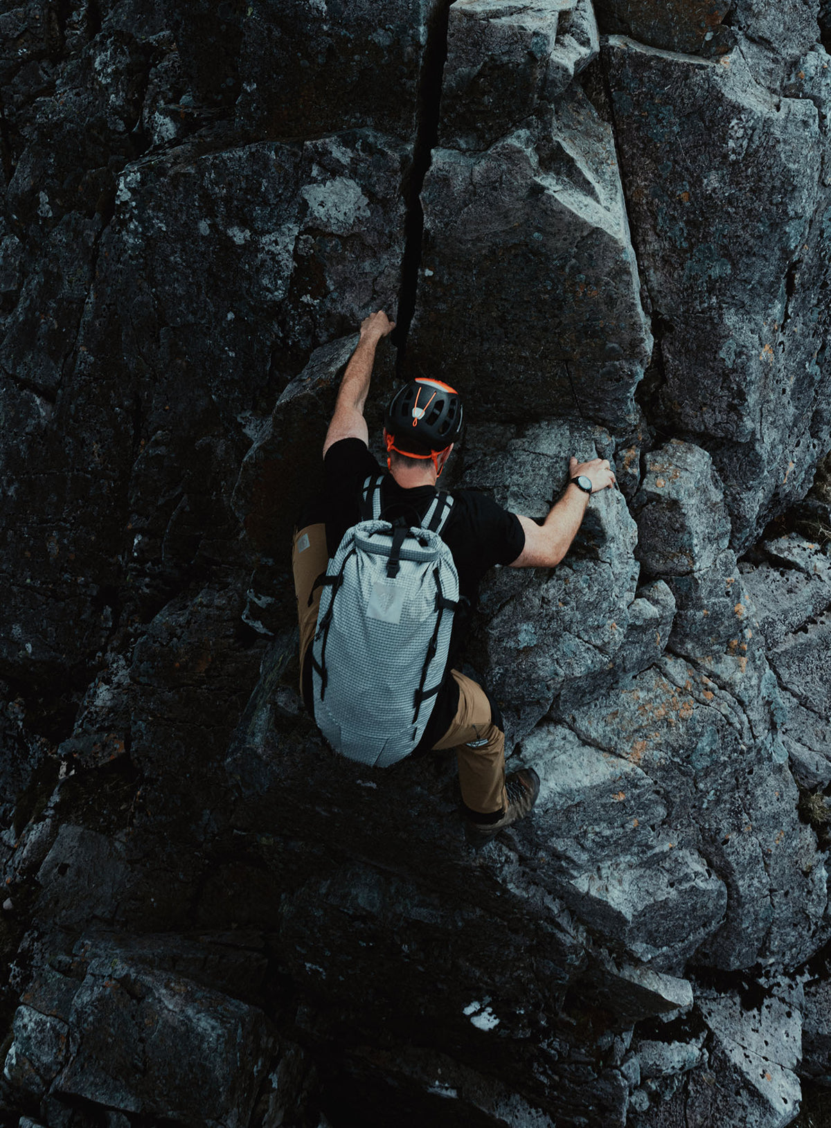 An in the field image of Orbital 30L Dyneema Climbing Backpack in Antimony Grey (ITF)
