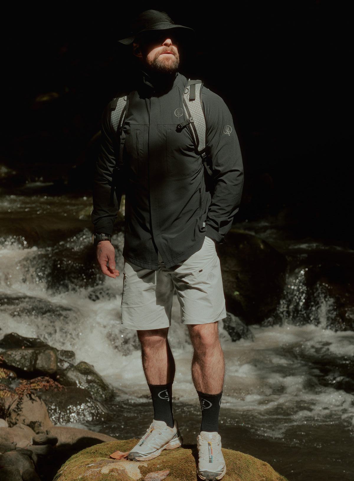 An in the field image of Oryon Shorts in Grey (ITF)