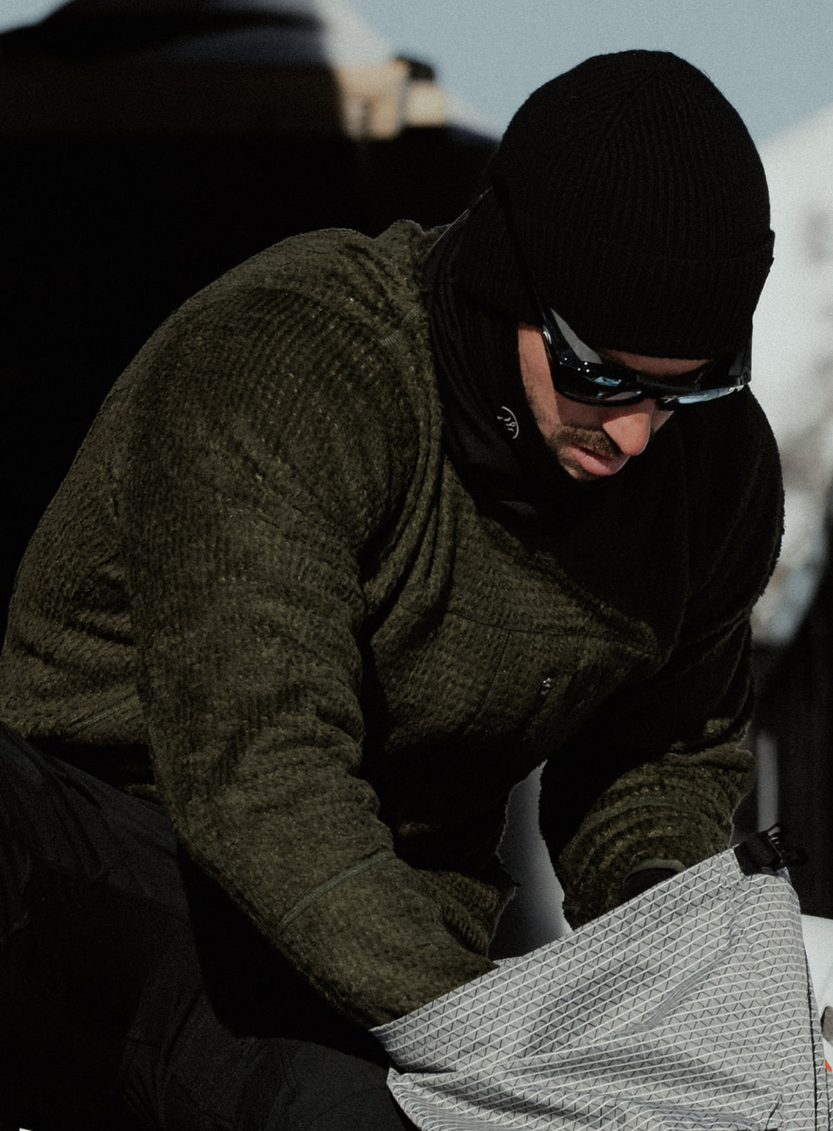 An in the field image of Phalanx Crew Fleece in Forest Green (ITF)