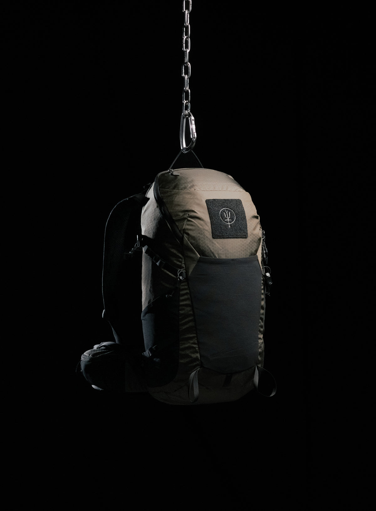 A creative studio shot of Pinnacle 28L Hiking Backpack in Olive Green (CS)