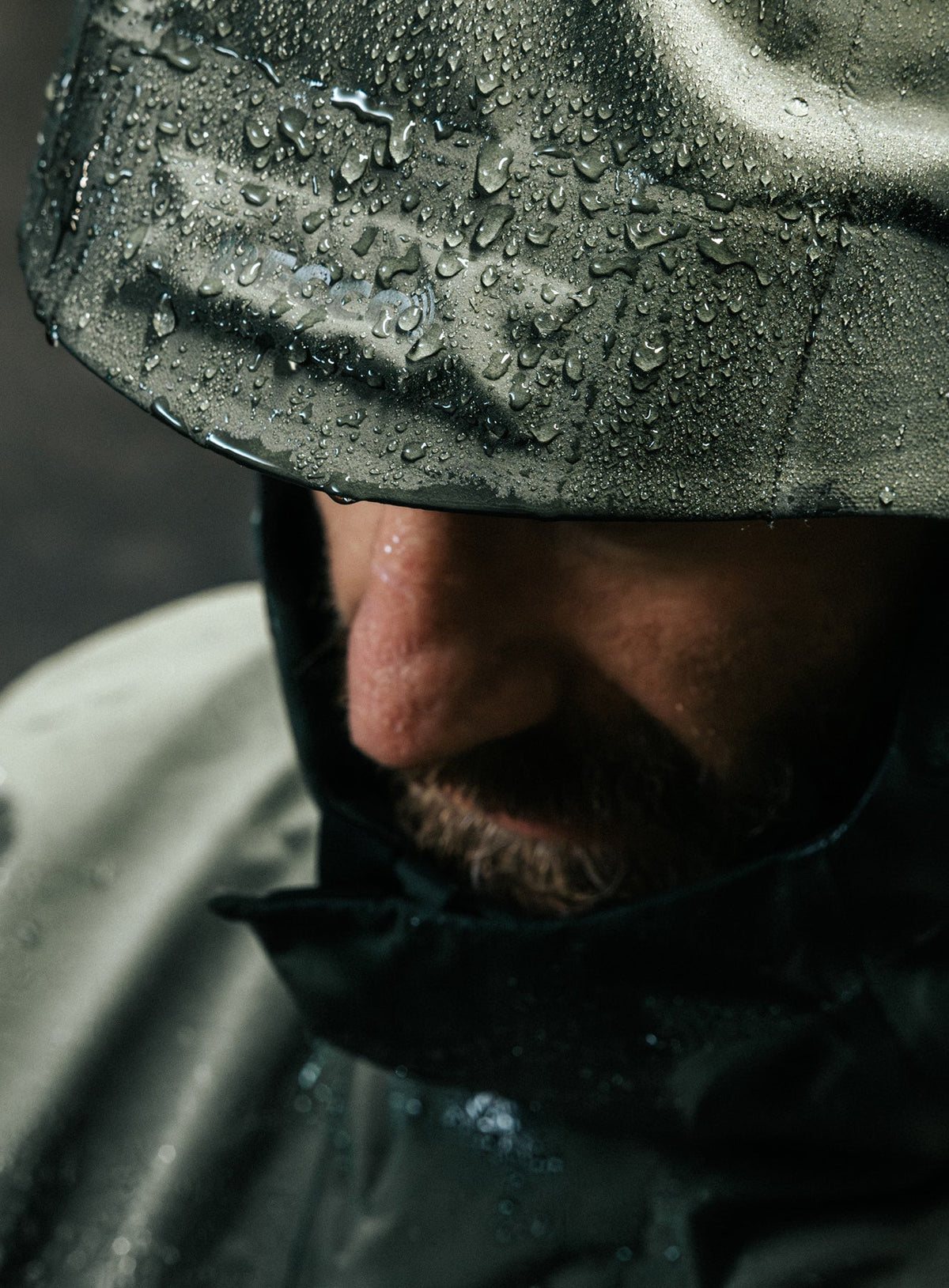 An in the field image of Men's Renegade Parka in Forest Green (ITF)