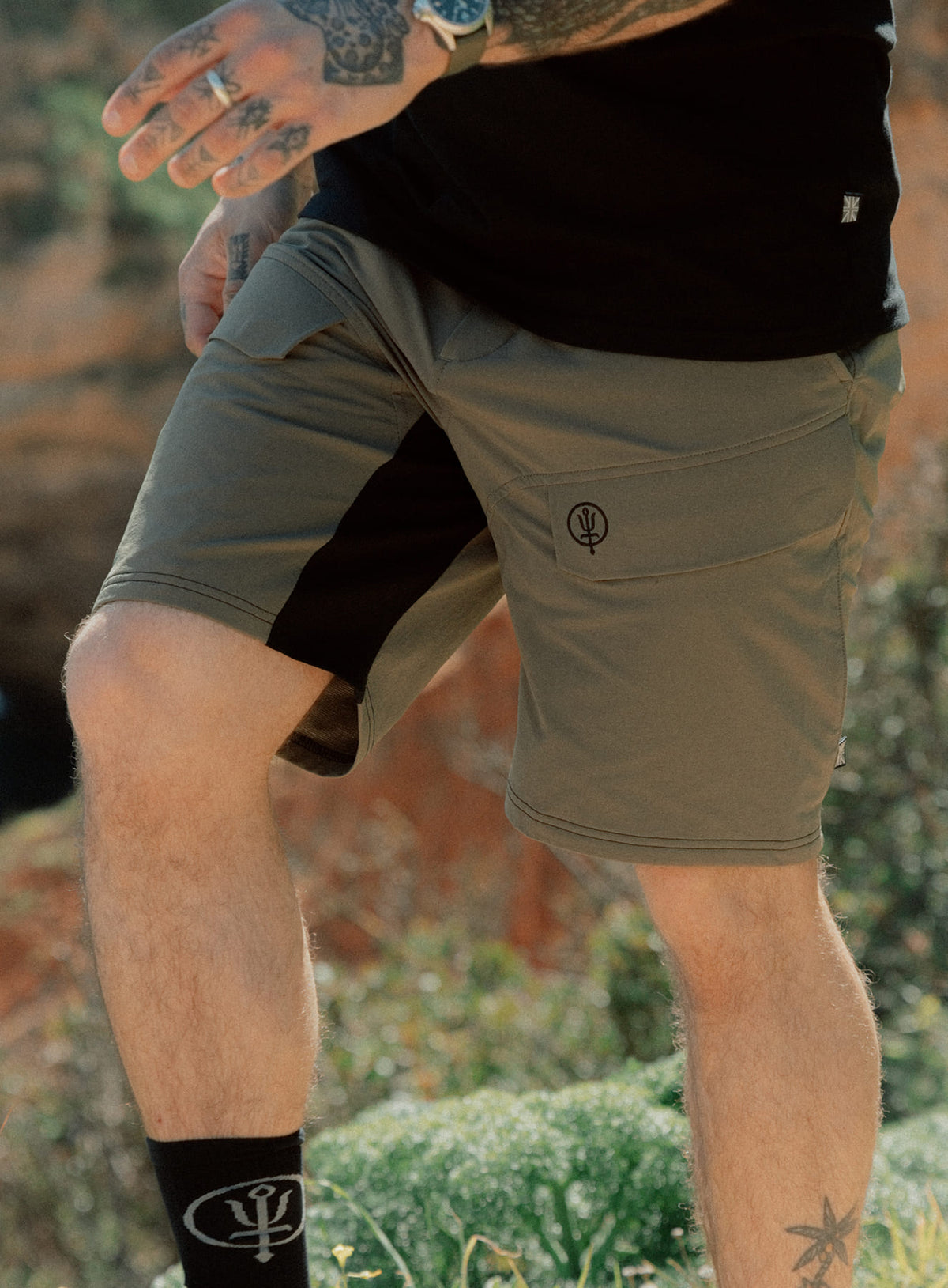 An in the field image of Men's Strike Shorts in Khaki (ITF)