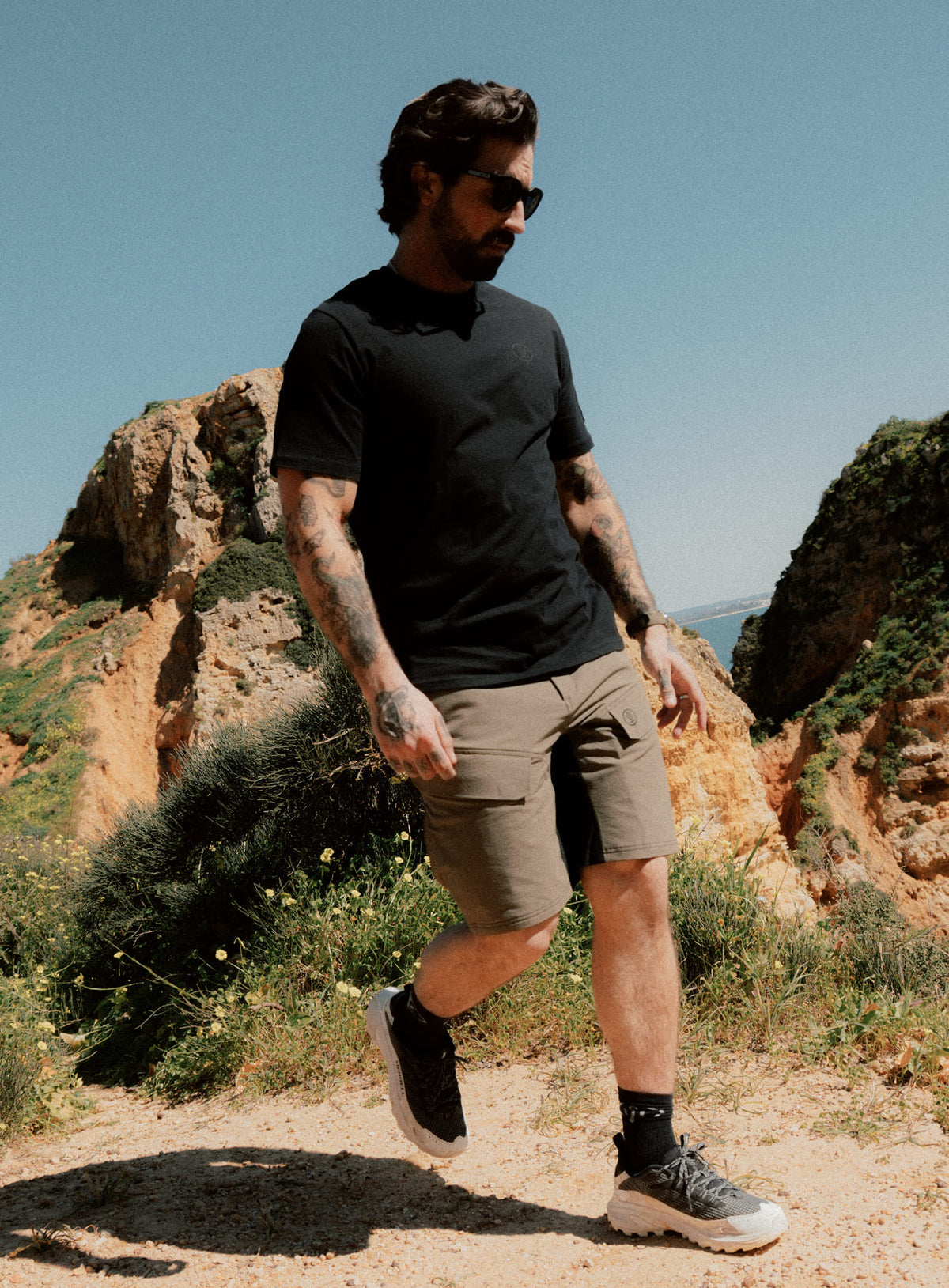 An in the field image of Men's Strike Shorts in Khaki (ITF)