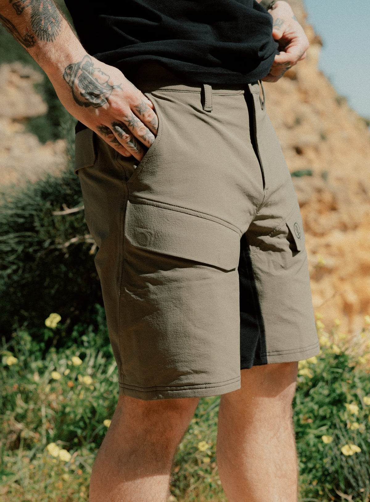 An in the field image of Men's Strike Shorts in Khaki (ITF)