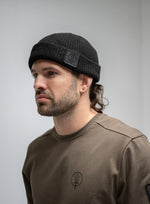 A studio shot of Waffle Knit Beanie in Obsidian Black (SS)