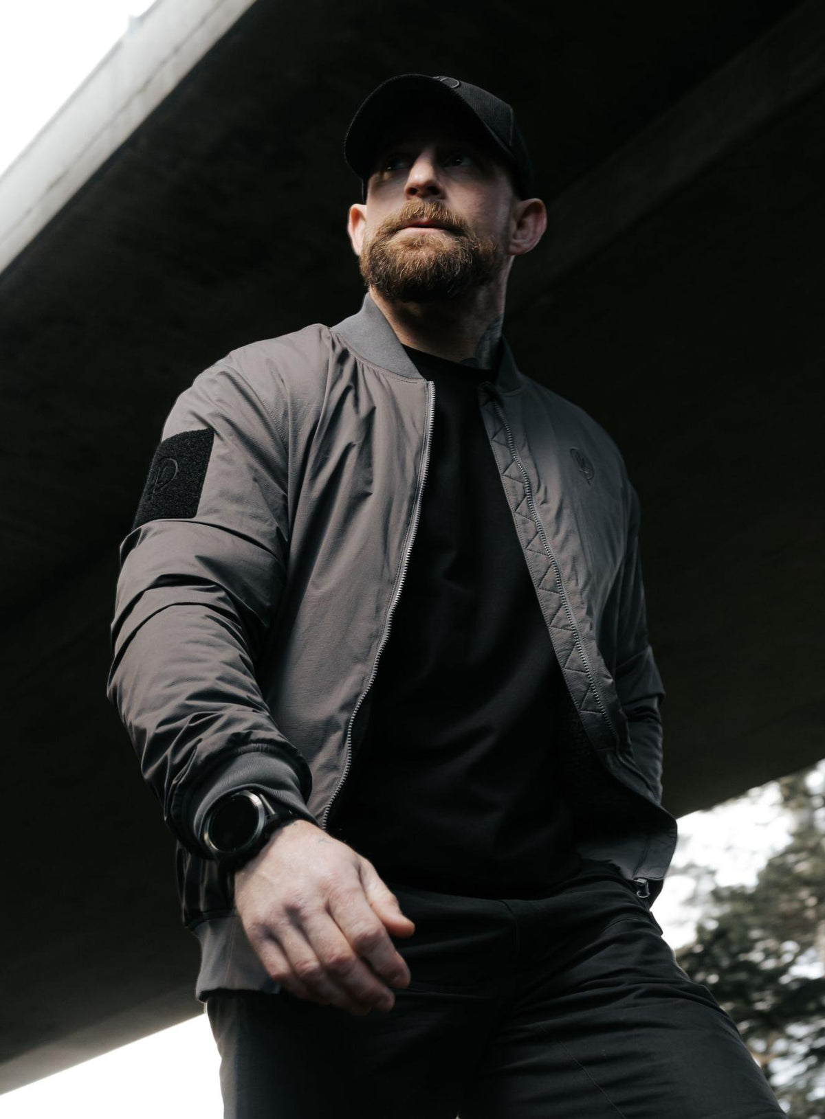 An in the field image of Men's Wraith Bomber Jacket in Raven Grey (ITF)